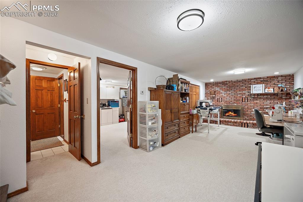 This room is now being used as a quilting room but the possibilities are endless. The 3rd common living space. 