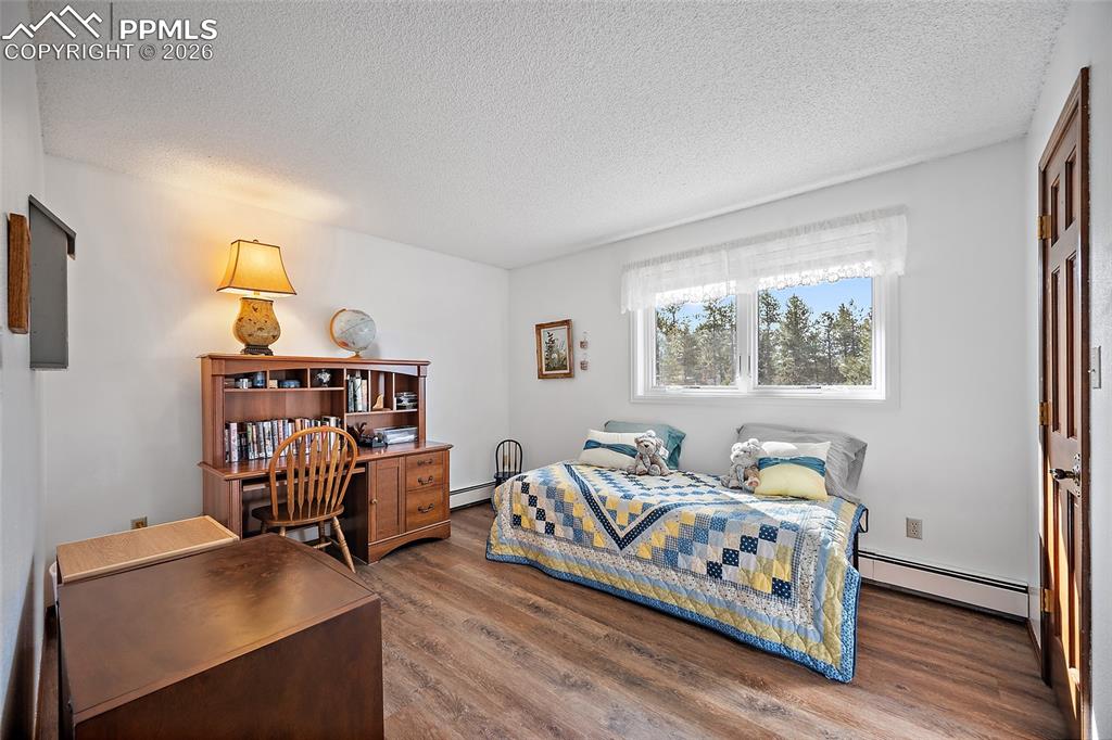 Big bedroom with walk in closet. Primary bedroom and 2 large bedrooms on the upper level. 