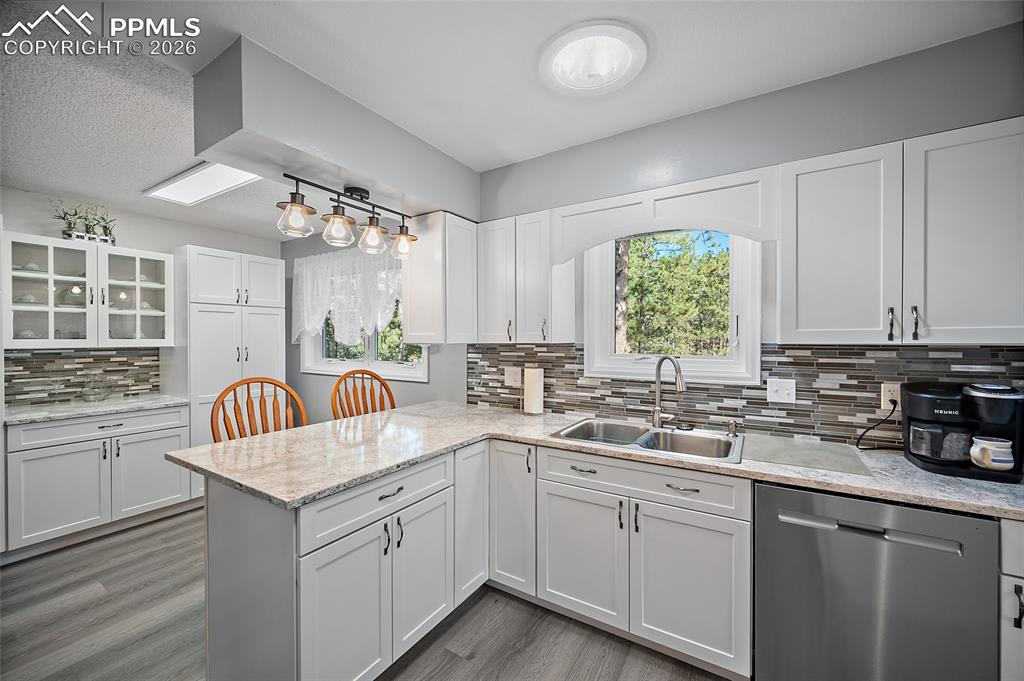 Completely upgraded with gorgeous quartz counter tops and designer backsplash.  