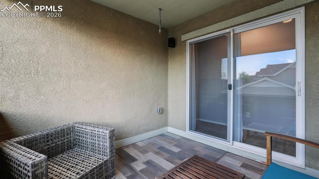 Walk Out from the Kitchen to a covered patio for outdoor dining and relaxation.