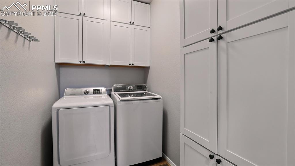 Laundry Room with built-in cabinets.