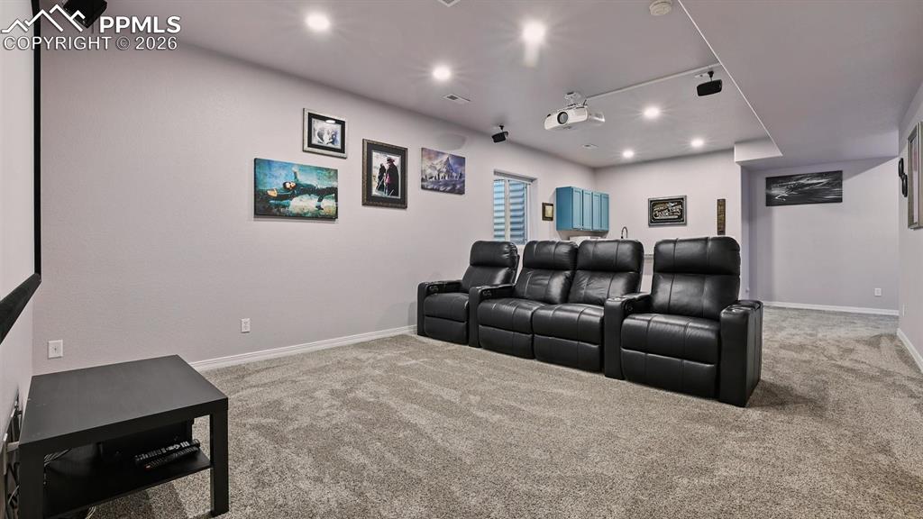 View of Theatre Rom and wet bar.