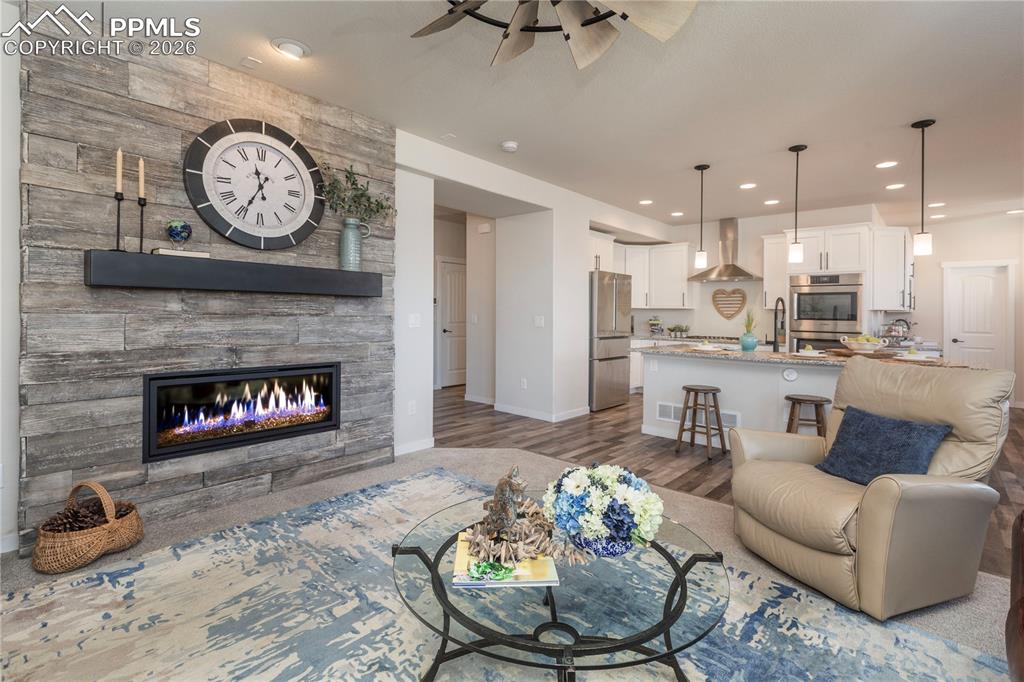 Open concept living, kitchen and dining rooms.