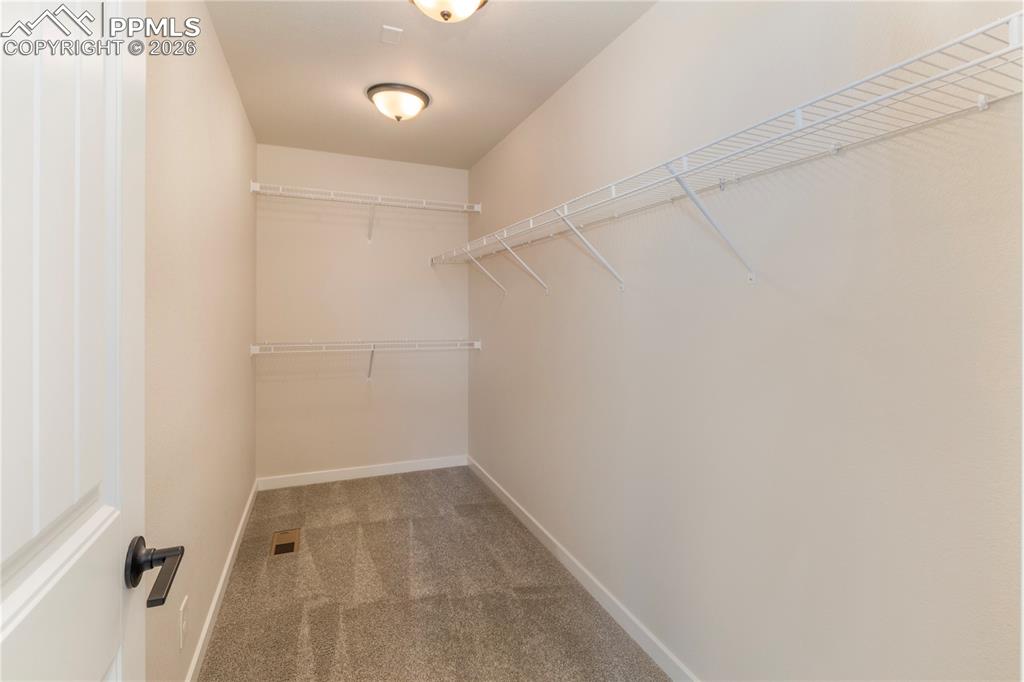 Very deep, walk-in closet.