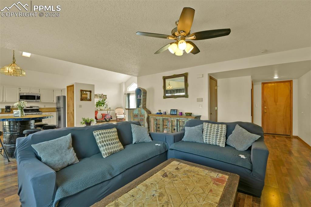 Spacious family room. Powder room, Laundry and entry to the garage are to the left. 