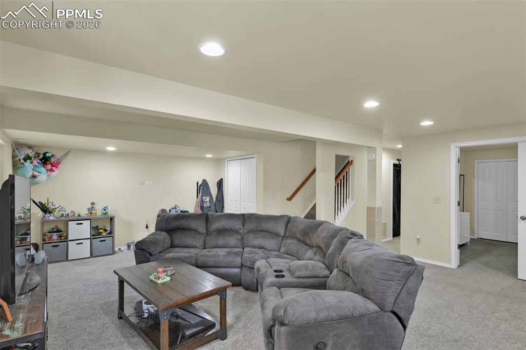 Basement Receation area. Bedroom to the right. Down the Hall to the Full Bathroom. 