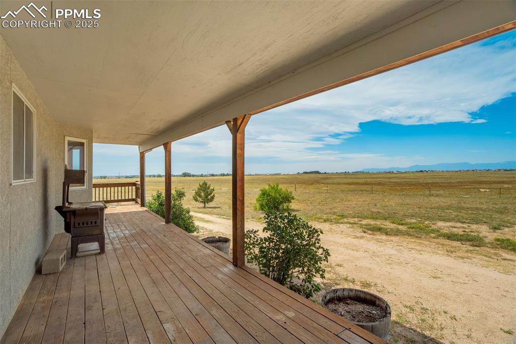 Wooden terrace with a view of rural / pastoral area
