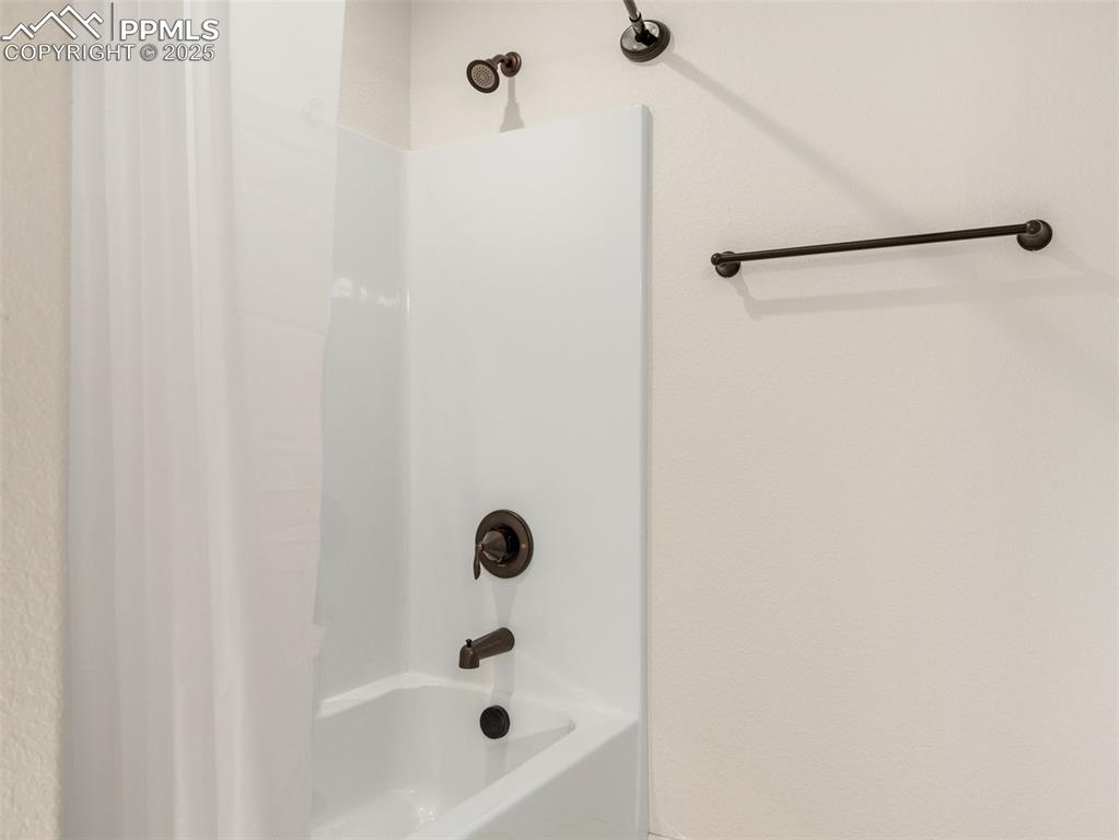 Bathroom featuring shower / tub combo