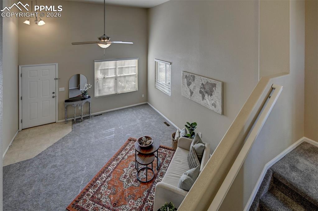 Looking down from dinning area to living room.