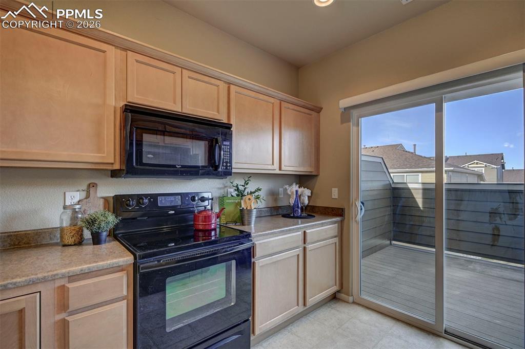 stove top oven with built in microwave oven. Ample storage all around.