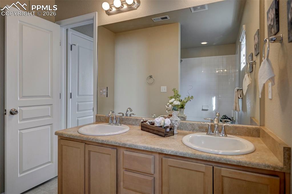 Two sinks, lots of space in primary bathroom.