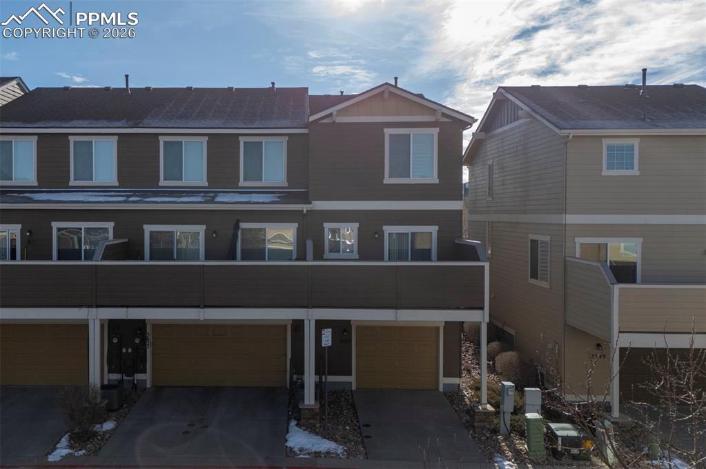 Covered parking going into attached garage.