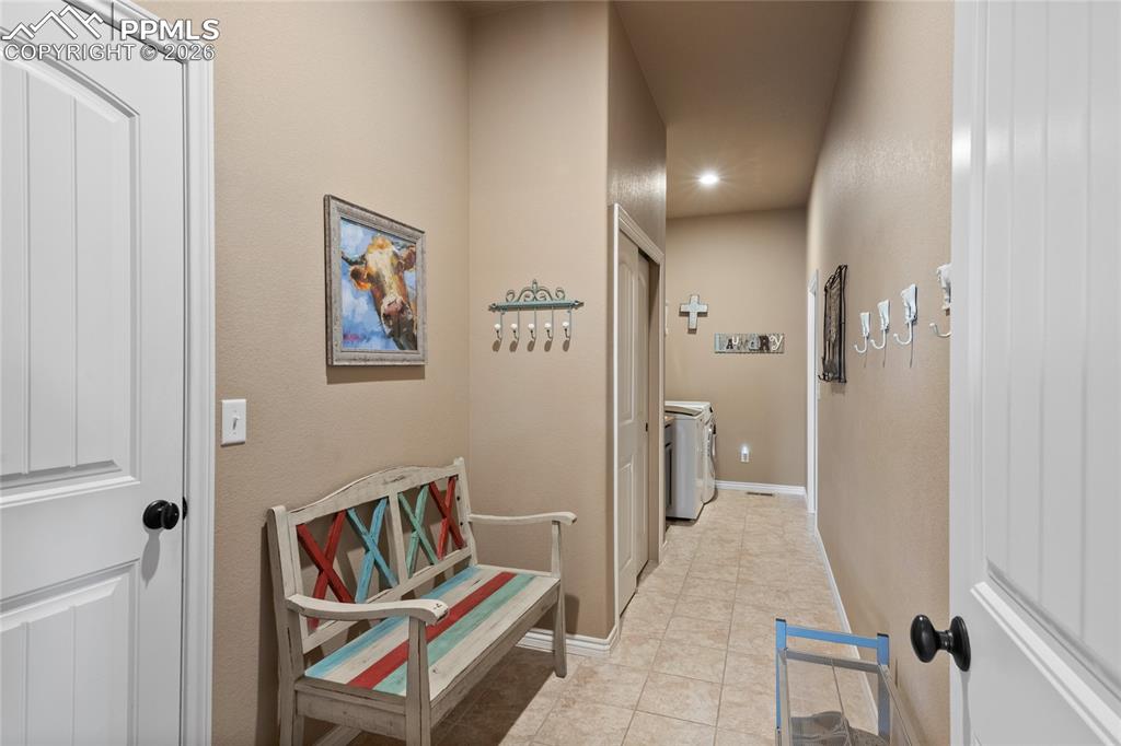 Laundry room/mudroom with entryway from the garage. Private from the rest of the home. 
