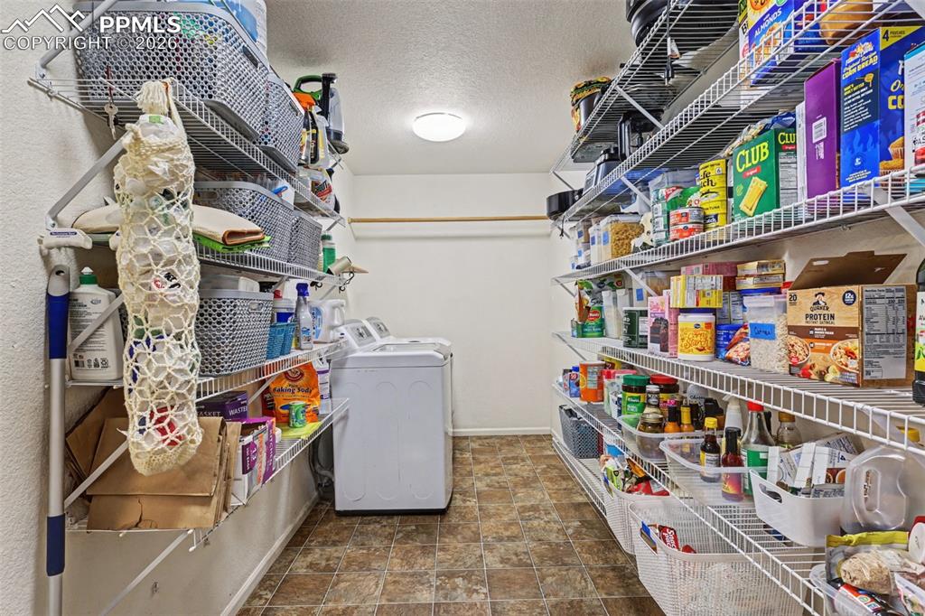 Laundry and Kitchen Pantry Area just off Kitchen