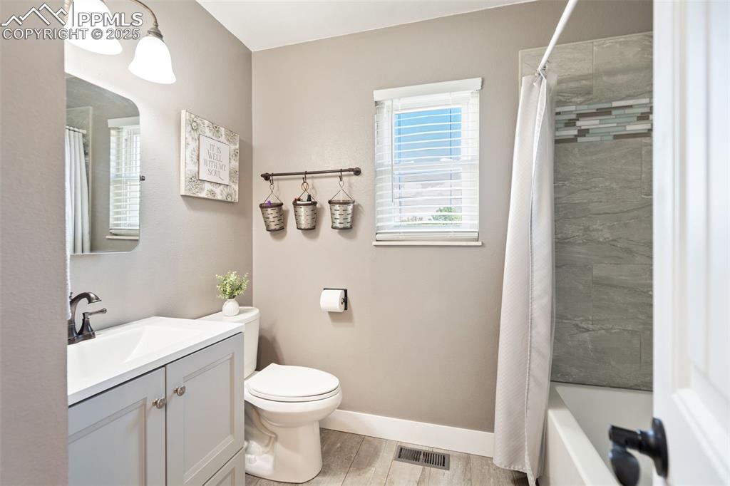 Nicekly updated full bath on the main level - tub/shower combo.