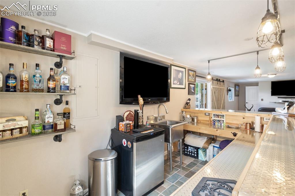 This custom wet bar has all you need for entertaining!