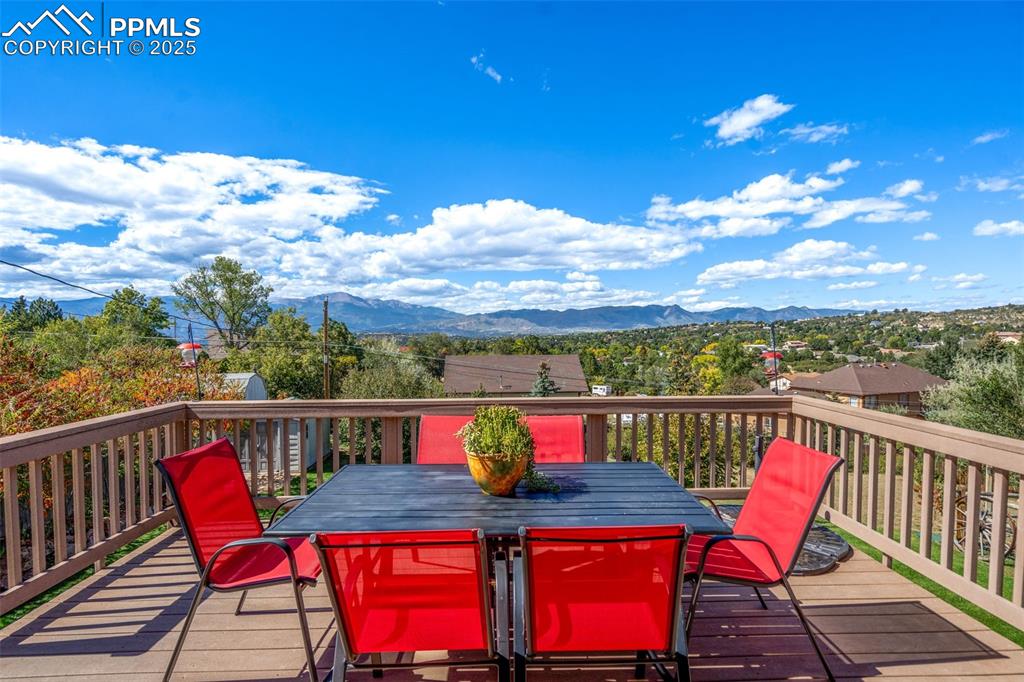 Lovely composite deck off the kitchen/living room offering amazing Pikes Peak and mountain views!