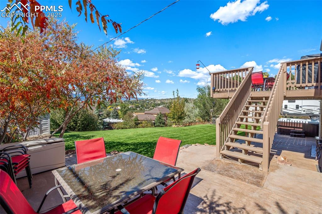 Additional patio space - lots of room to enjoy this beautiful backyard!