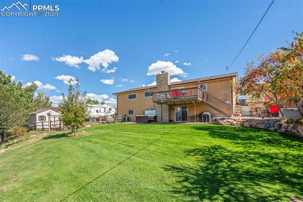 Beautiful backyard space that is fully fenced and well cared for. 