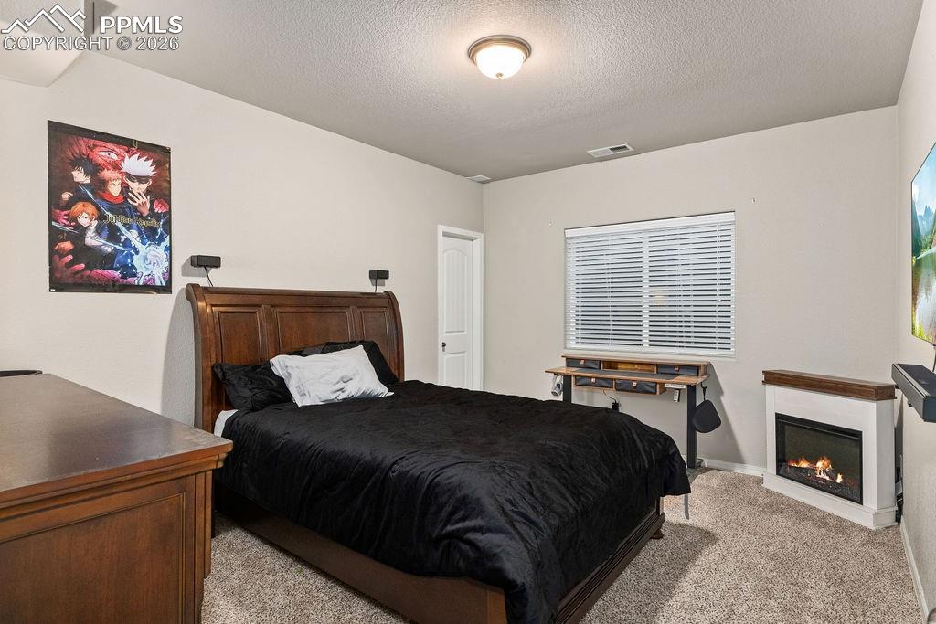 Basement bedroom #1 with an egress window.