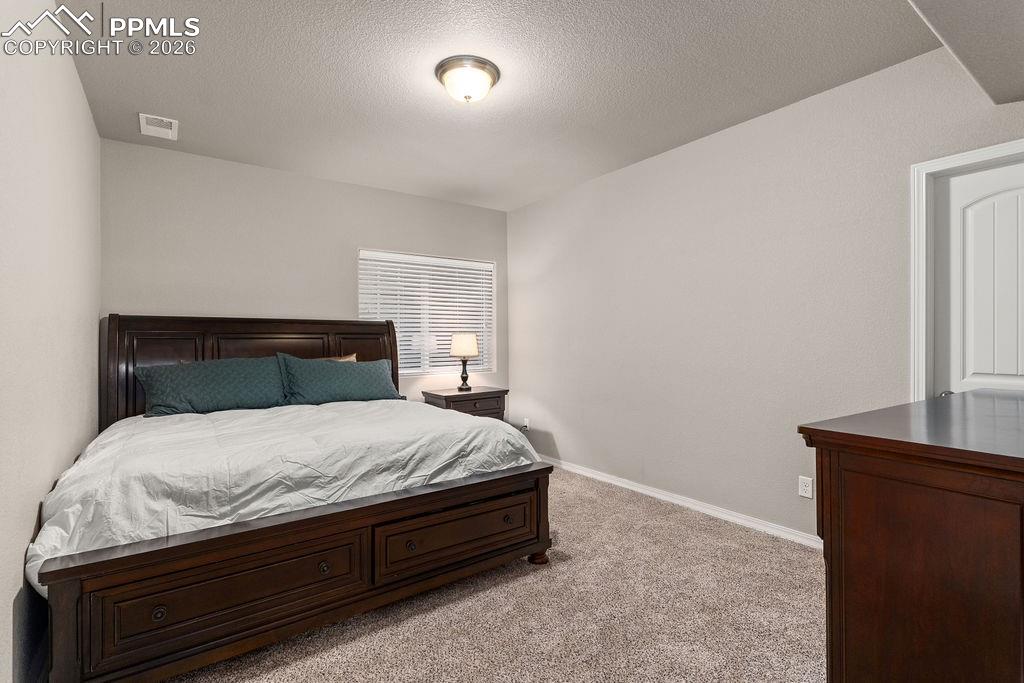 Basement bedroom #2 with an egress window.
