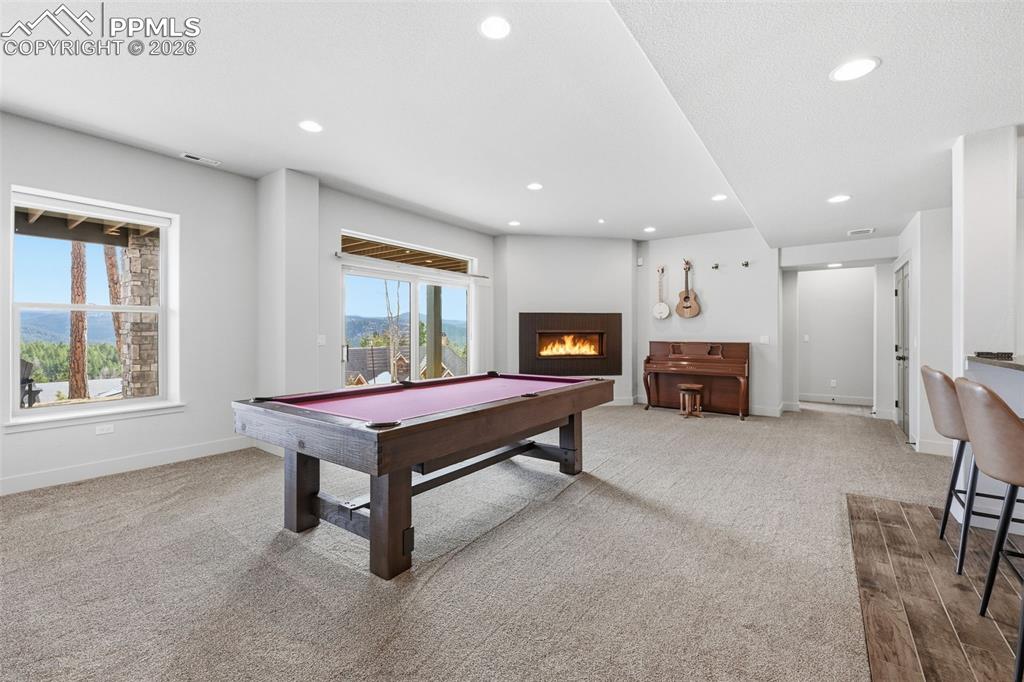 Large rec room for all kinds of activities!  Pool table included!