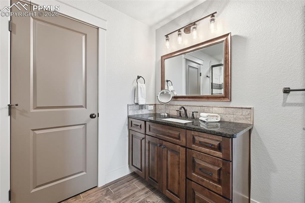En suite bathroom with it's own linen closet!