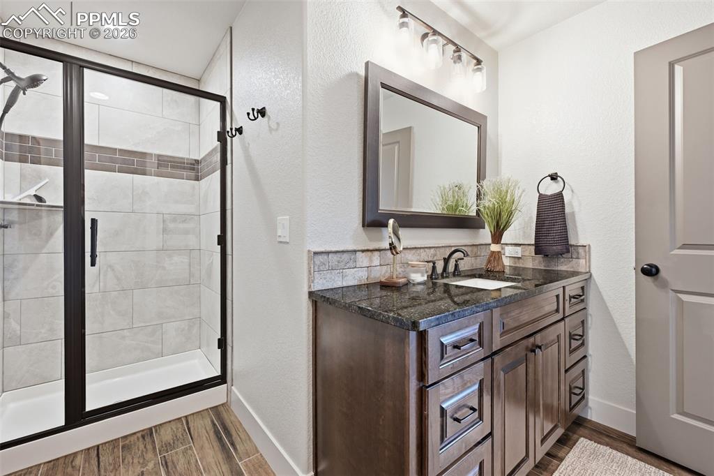 Large basement bath with walk in shower and large vanity