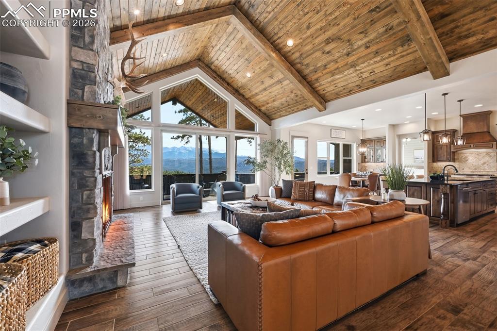 Open floor plan and wood ceiling that extends to the deck!