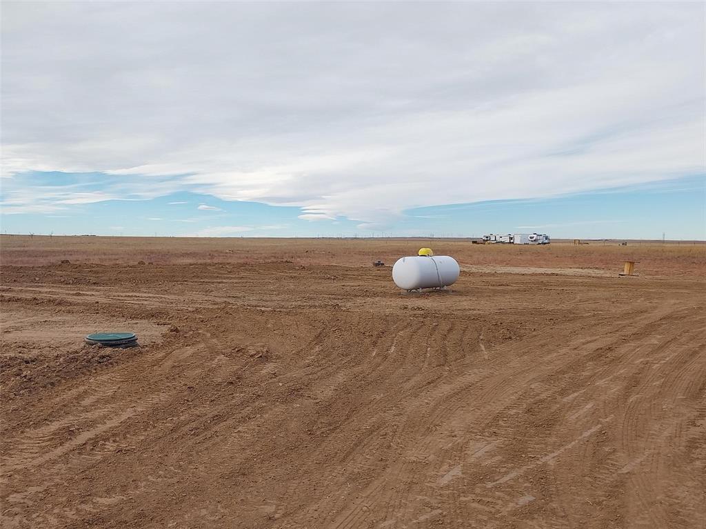 View of yard with a view of countryside