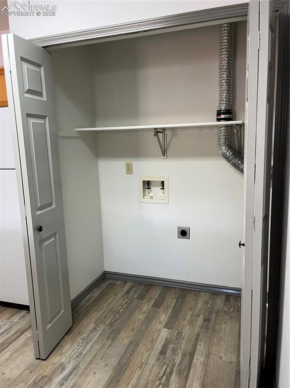 Laundry closet in kitchen is handy and houses the water heater as well.