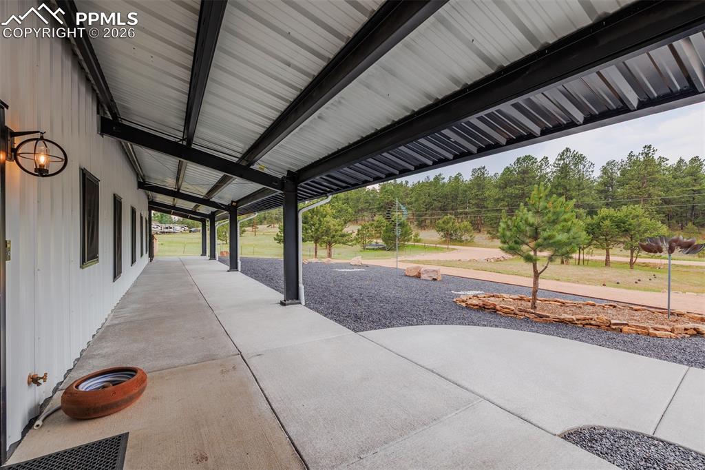 Front covered patio that wraps around to the side