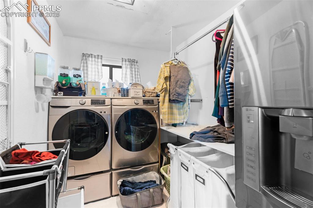 Laundry area with separate washer and dryer
