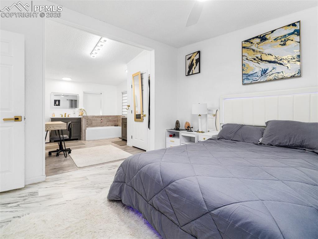 Bedroom featuring ceiling fan