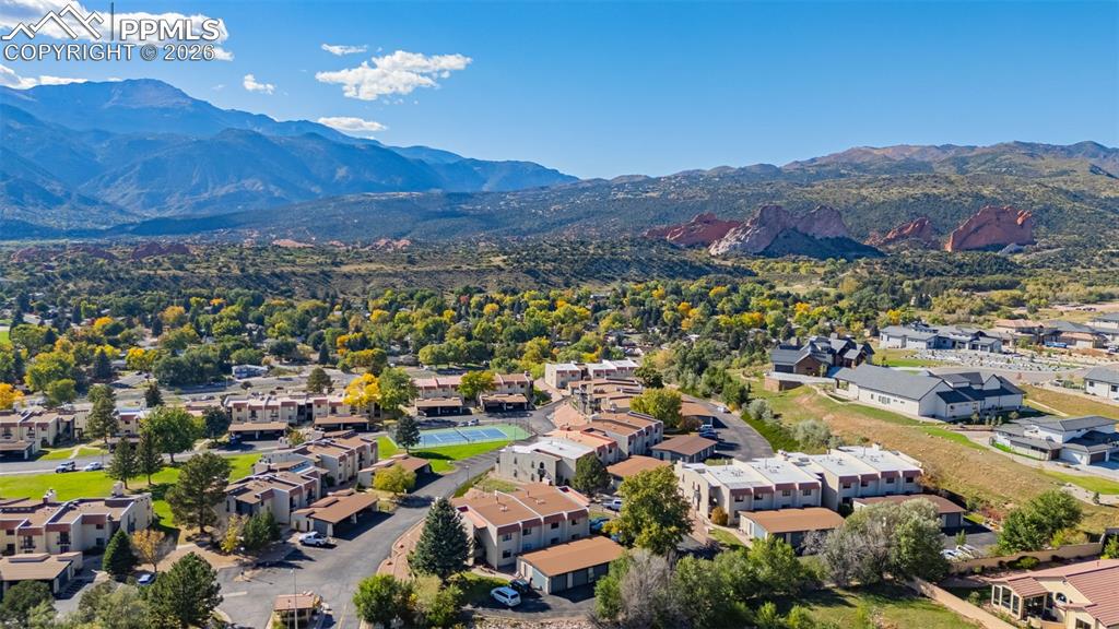 Aerial view of residential area featuring a mountain backdrop