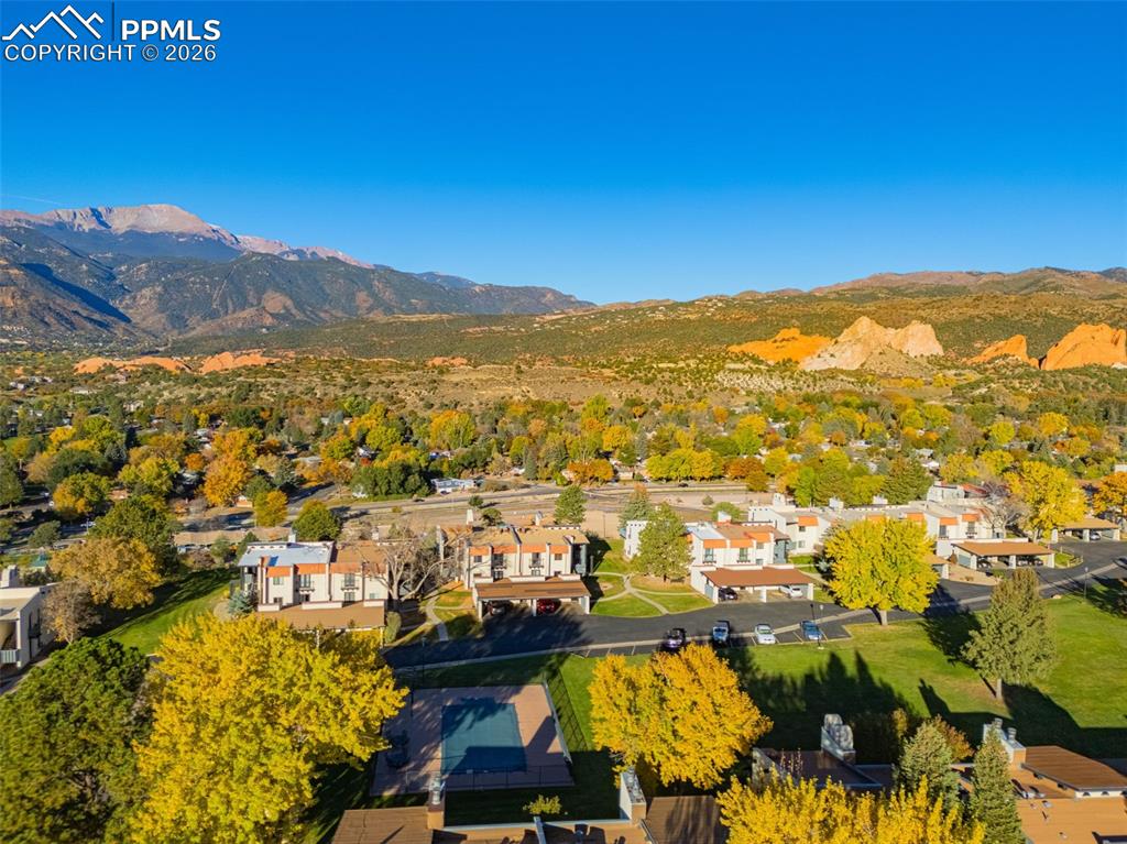 Aerial view of residential area featuring mountains