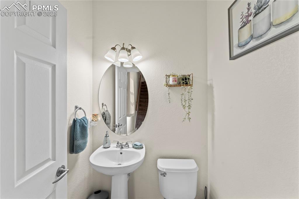 Bathroom featuring a textured wall