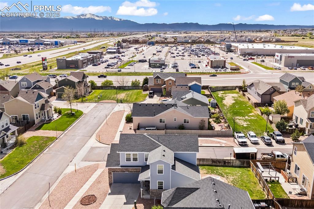 Aerial view of residential area with a mountain backdrop