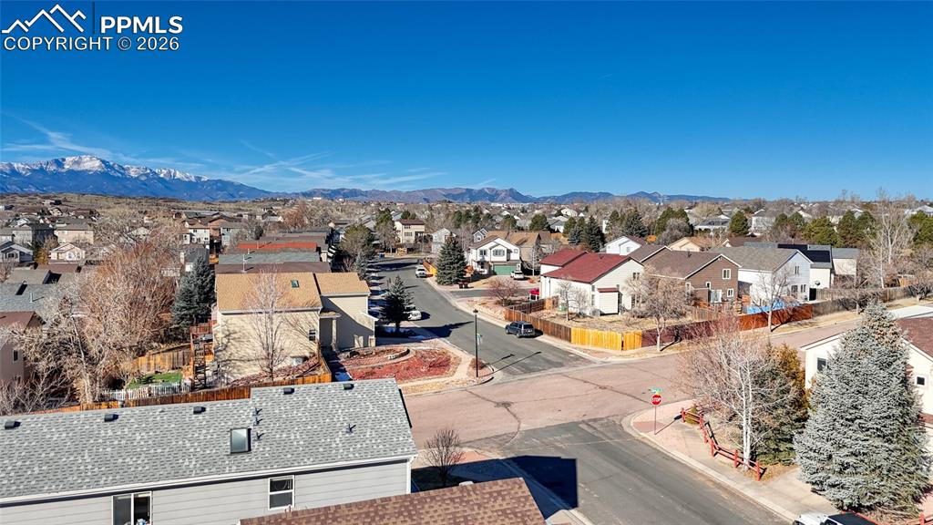 Aerial view of residential area with a mountain backdrop