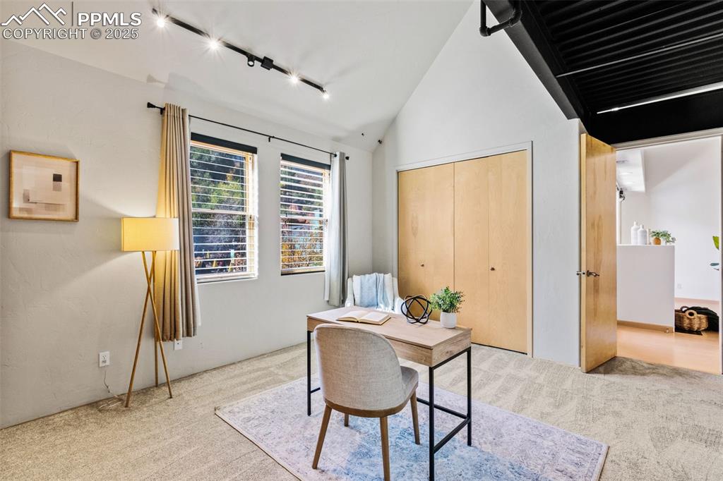 Second primary bedroom with adjoining bathroom and two closets