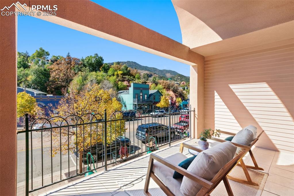 Patio overlooking Mantiou Ave featuring a mountain view