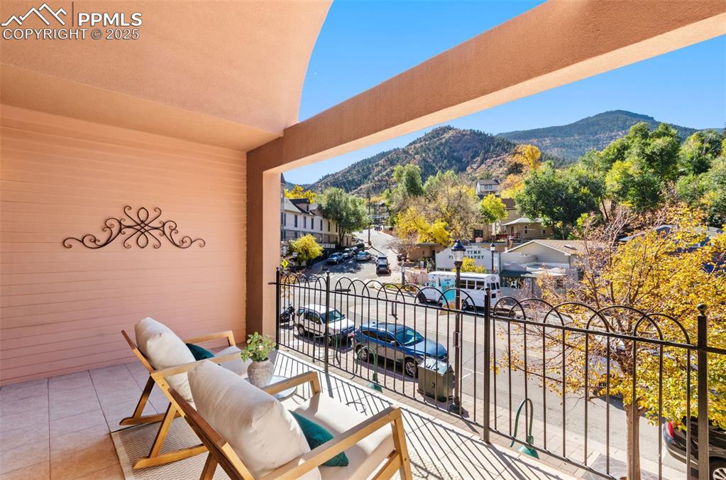 Patio overlooking Mantiou Ave featuring a mountain view