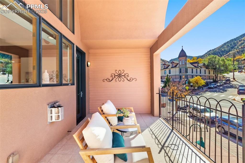 Patio overlooking Mantiou Ave featuring a mountain view