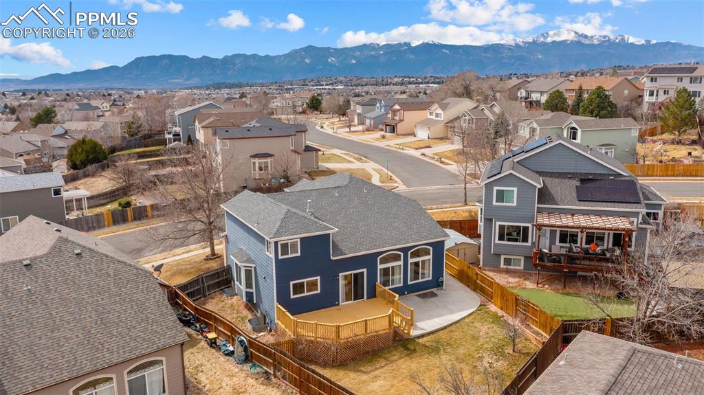Aerial perspective of suburban area with mountains