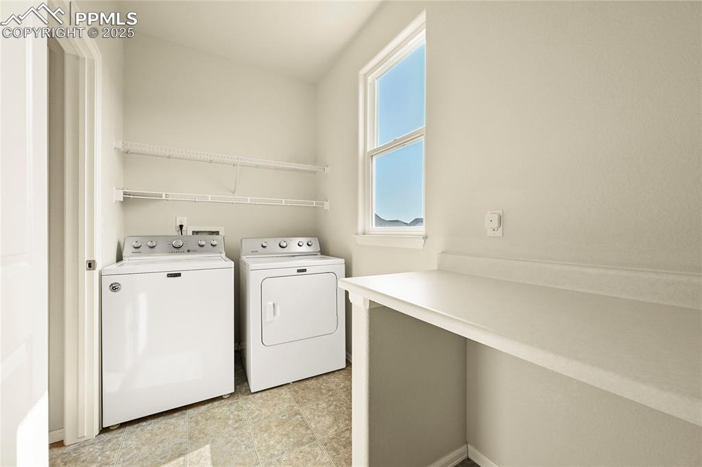Laundry room with washer and dryer