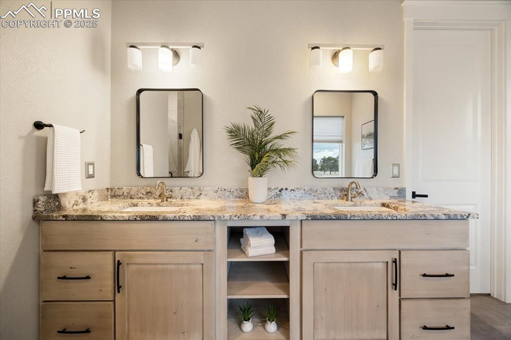 Bathroom with double vanity and a sink