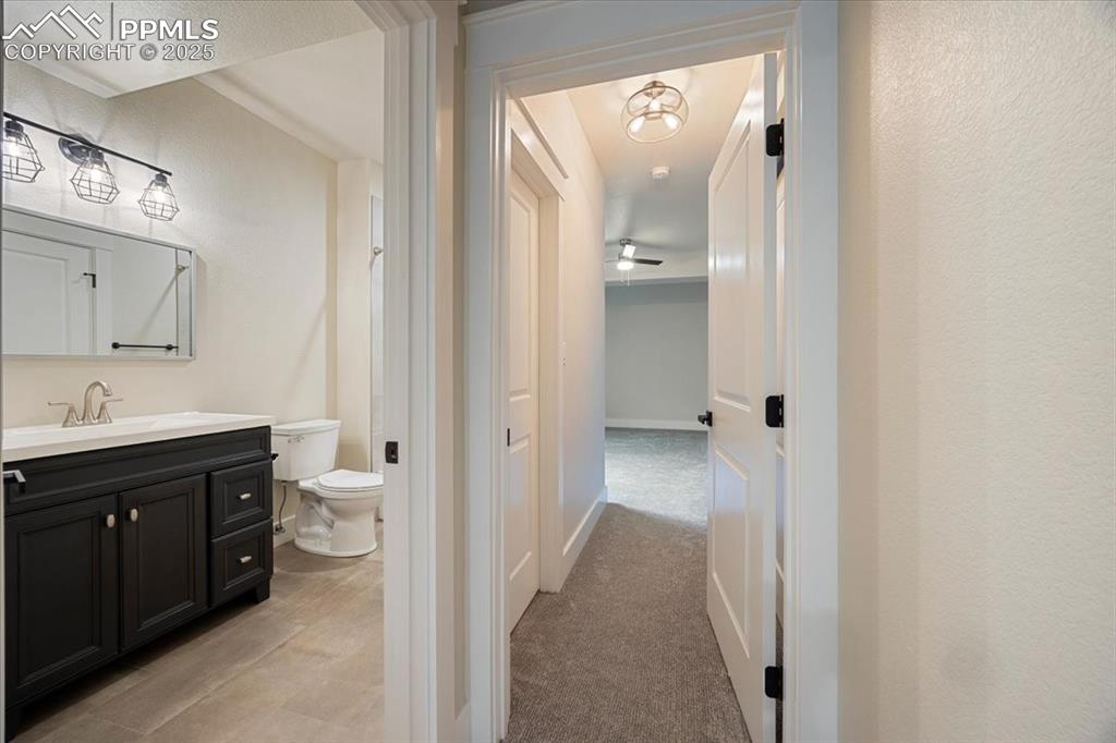 Bathroom with toilet and vanity