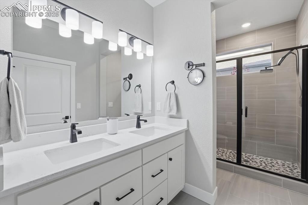 The primary bedroom has a private, ensuite bath.