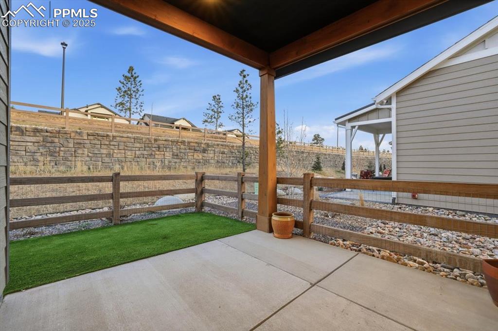 The covered patio is the perfect spot for a morning cup of coffee. 
