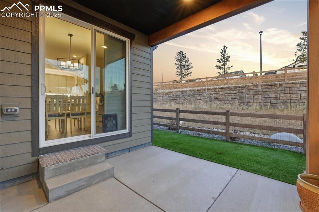 There is a gas line to the left of the sliding glass door for easy access to the kitchen and dining area from the grill. 